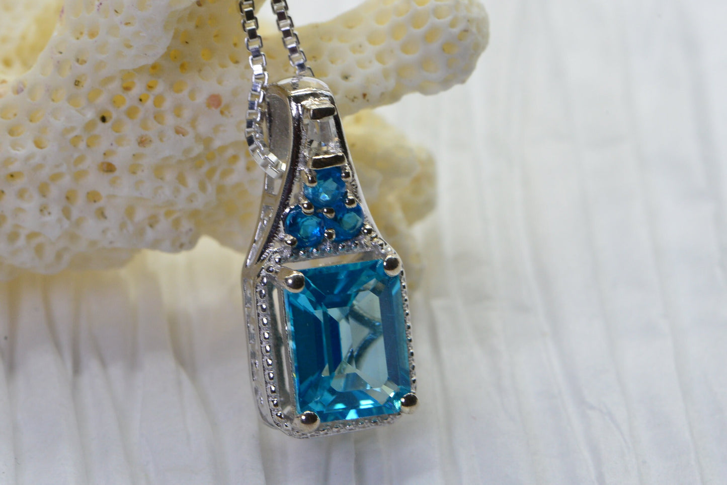 Emerald Cut Blue Topaz Sterling Silver Pendant Necklace - Halo Style