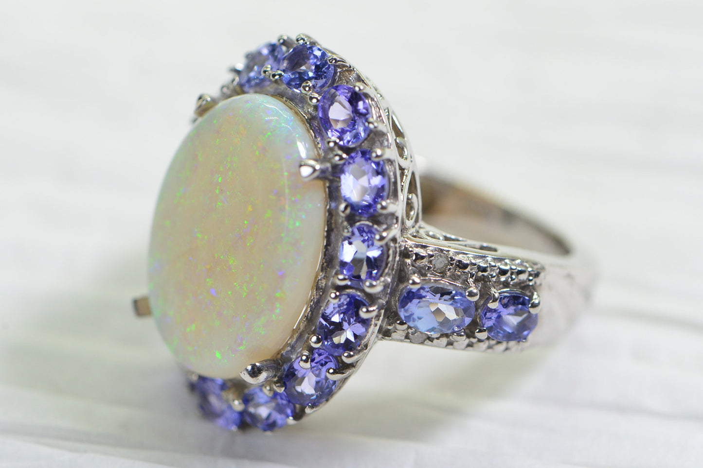 Australian White Opal Ring: Sterling Silver Halo, Tanzanite Accent