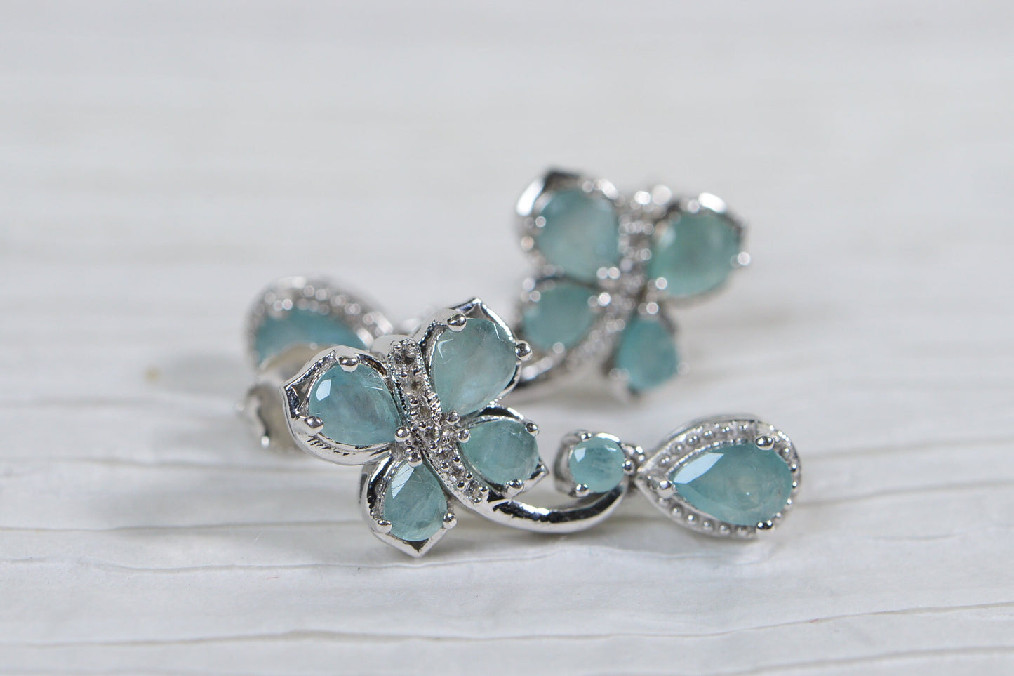 Butterfly Grandidierite Teardrop Earrings: Diamond Platinum over Sterling Silver
