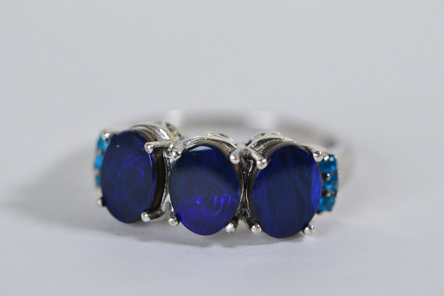 Australian Opal Sterling Silver Ring: Deep Blue Oval Trilogy, Apatite Accents