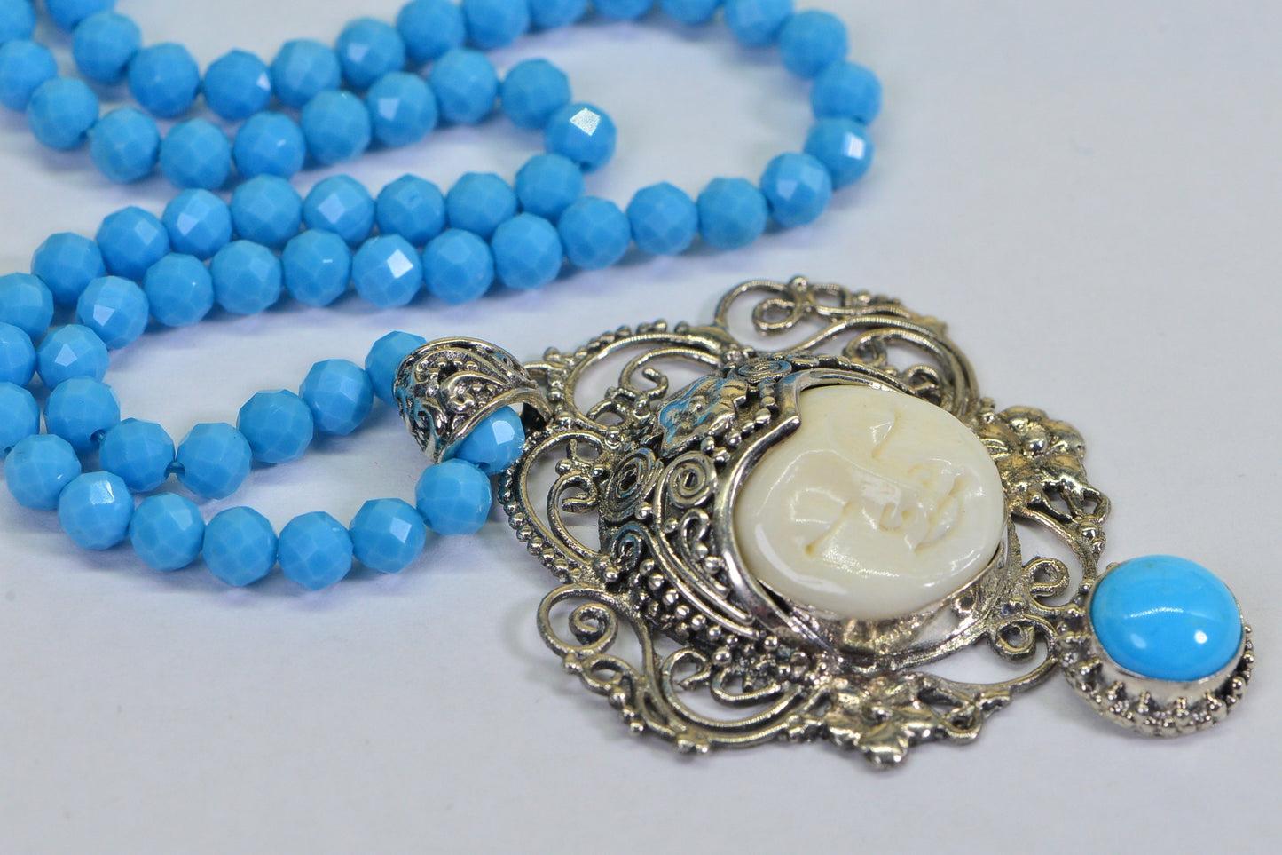 Bone Carved Cameo Moon Face Necklace: Sleeping Beauty Turquoise, Sterling Silver