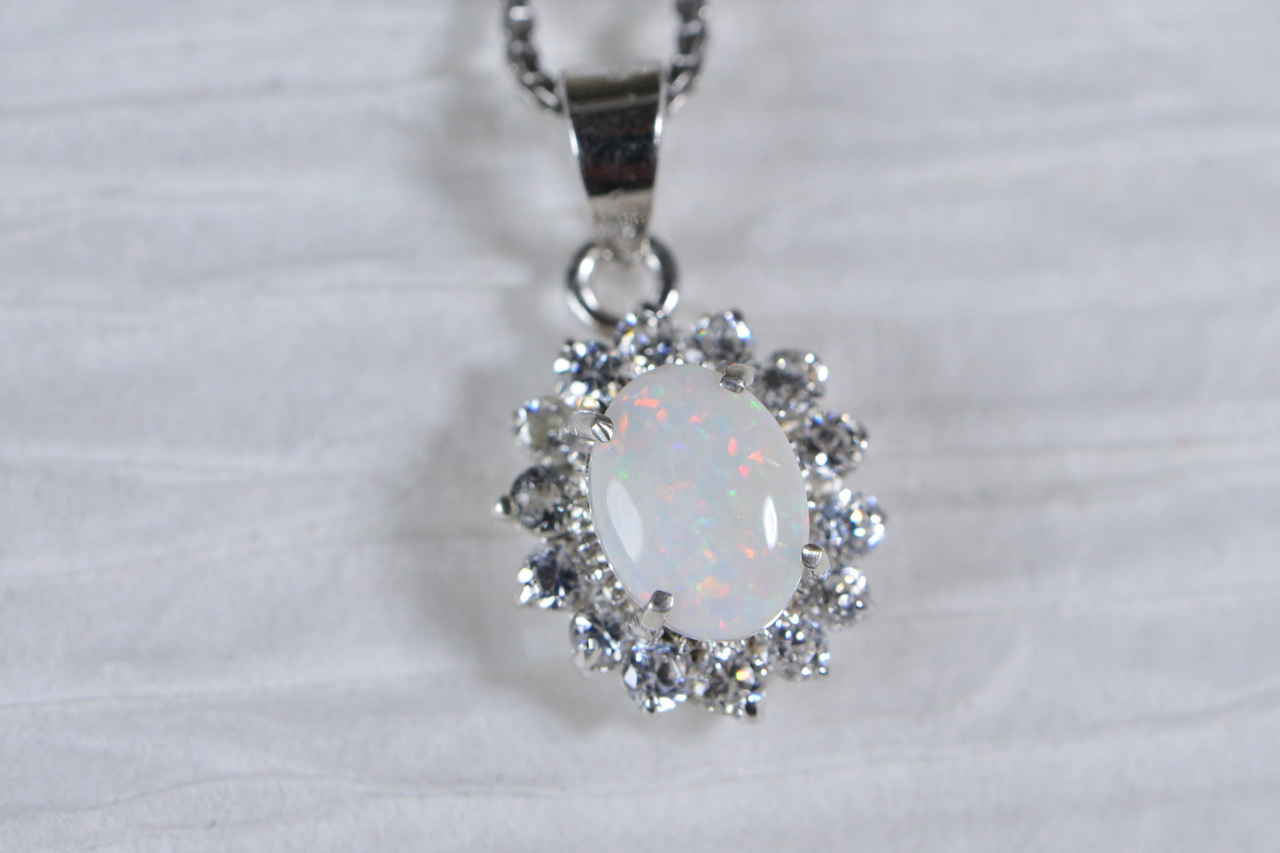 Australian Opal Pendant: 14K White Gold over Sterling Silver Halo