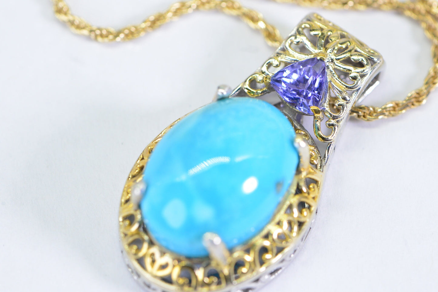 Sleeping Beauty Turquoise Tanzanite Pendant: 24K Gold Over Sterling Silver