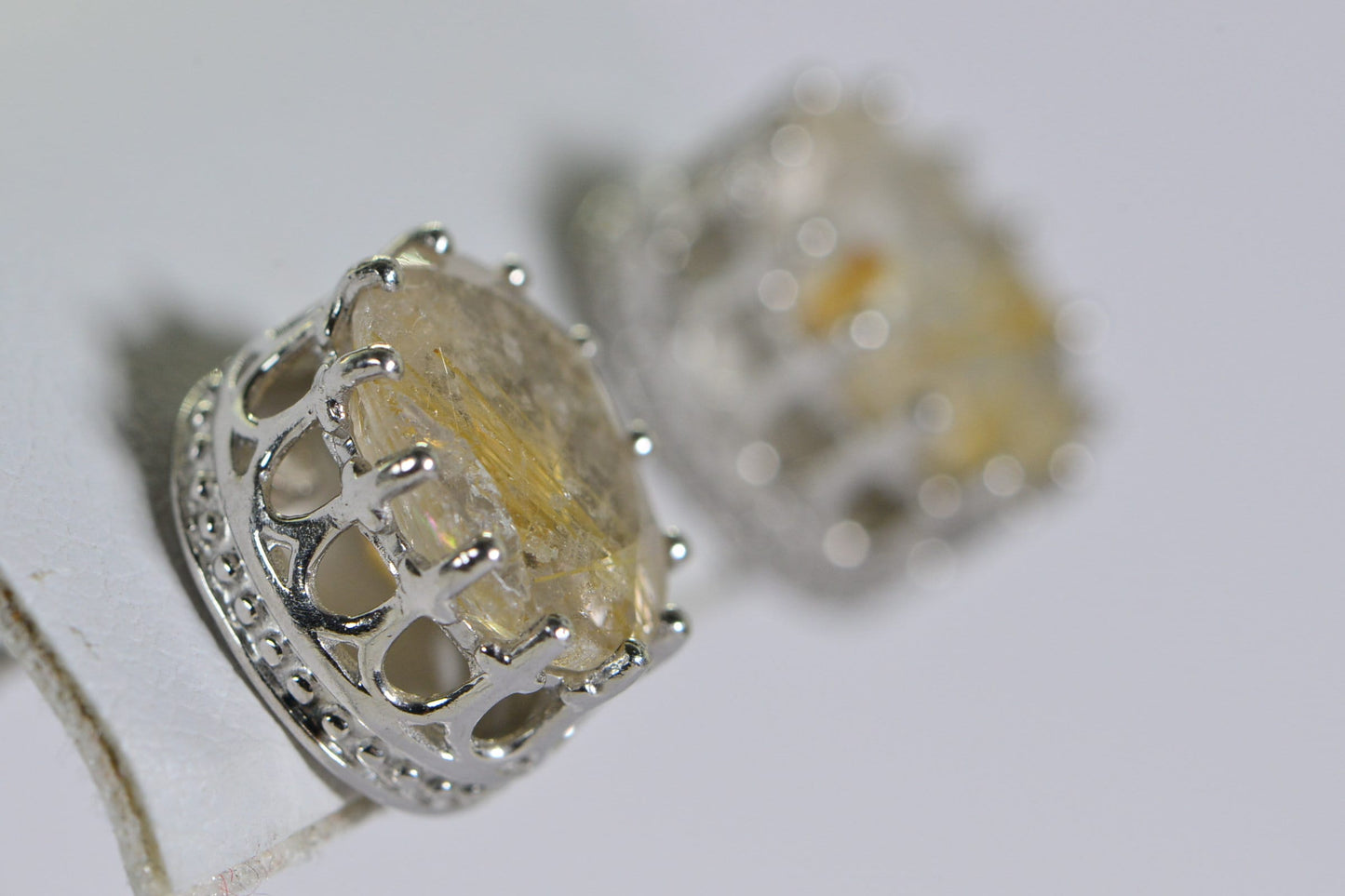 Golden Rutilated Quartz Stud Earrings: Sterling Silver, Oval Faceted Gem
