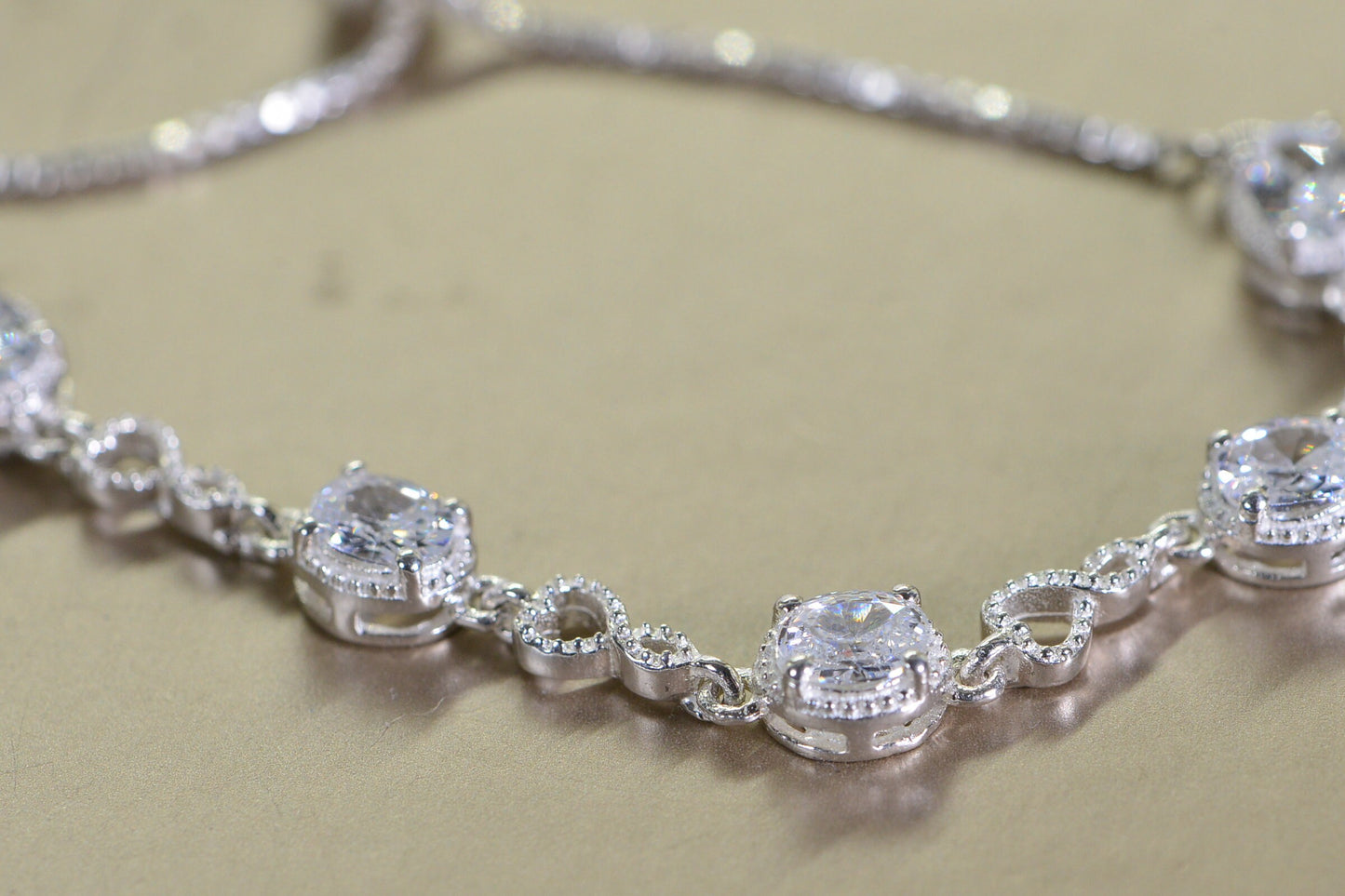Simulated Diamond Tennis Bolo Bracelet: Rhodium Sterling Silver, Milgrain Infinity