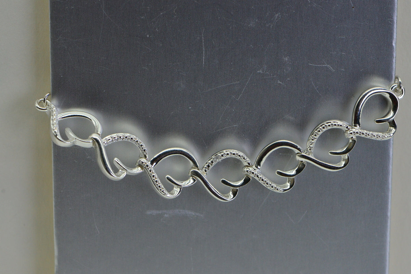 Diamond Heart Tennis Bracelet: Sterling Silver Bolo Bracelet