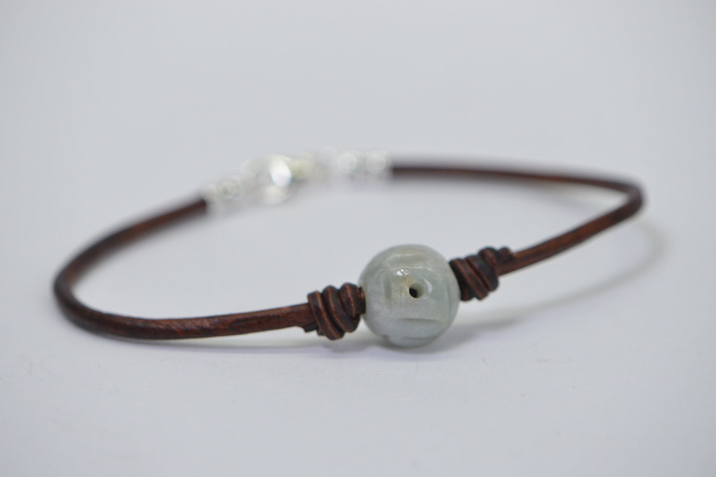 Burma Green Jade Lotus Bracelet: Carved Bead on Leather Cord