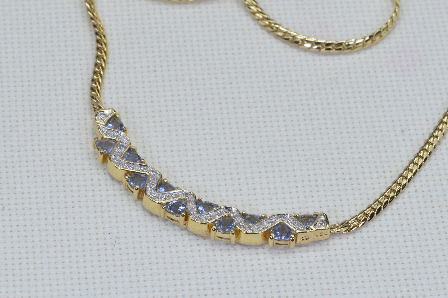 Simulated Tanzanite Necklace: 14K Gold Over Sterling Silver, Herringbone Chain