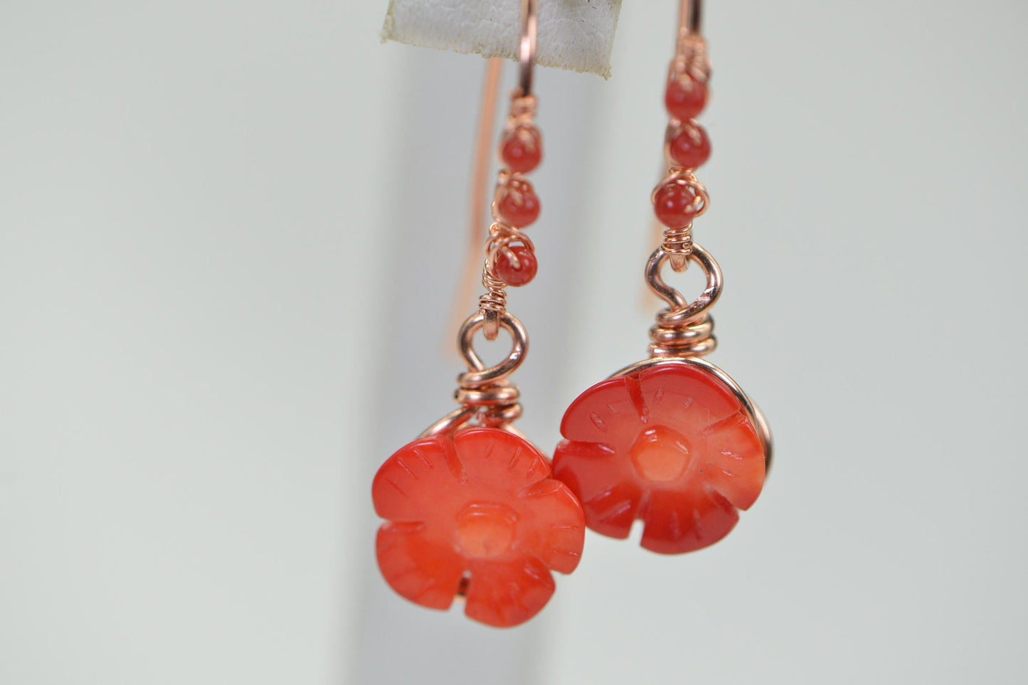 Carved Poppy Flower Red Coral Earrings: Wire Wrapped Copper