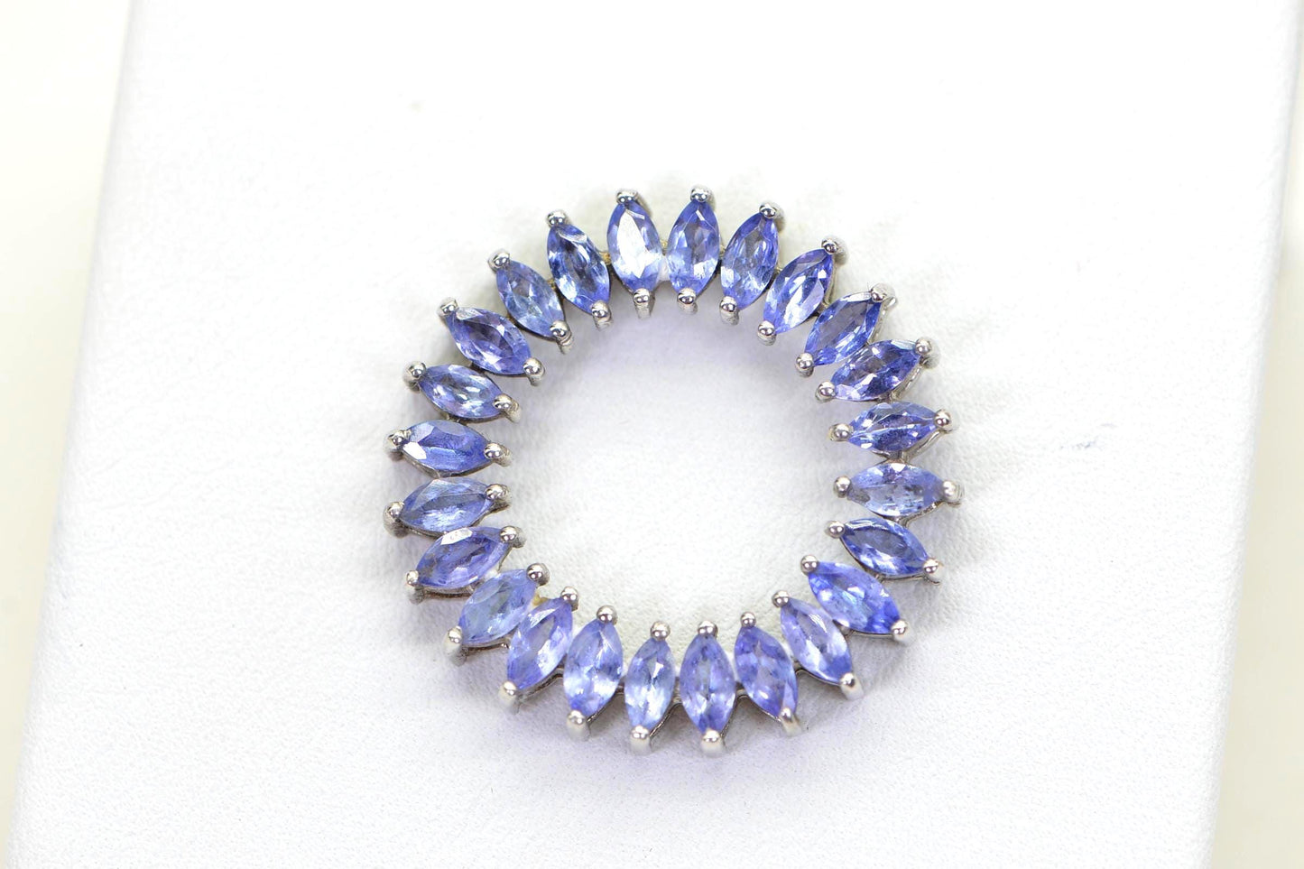 Tanzanite Circle Pendant Necklace: Sterling Silver Rhodium Finish, Floral Design