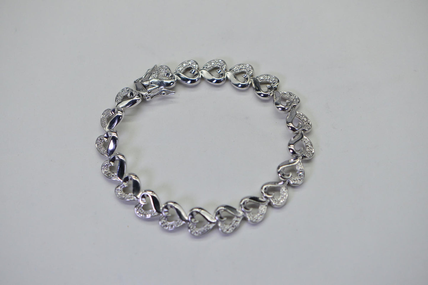 Natural Diamond Heart Tennis Bracelet: Sterling Silver Rhodium Finish