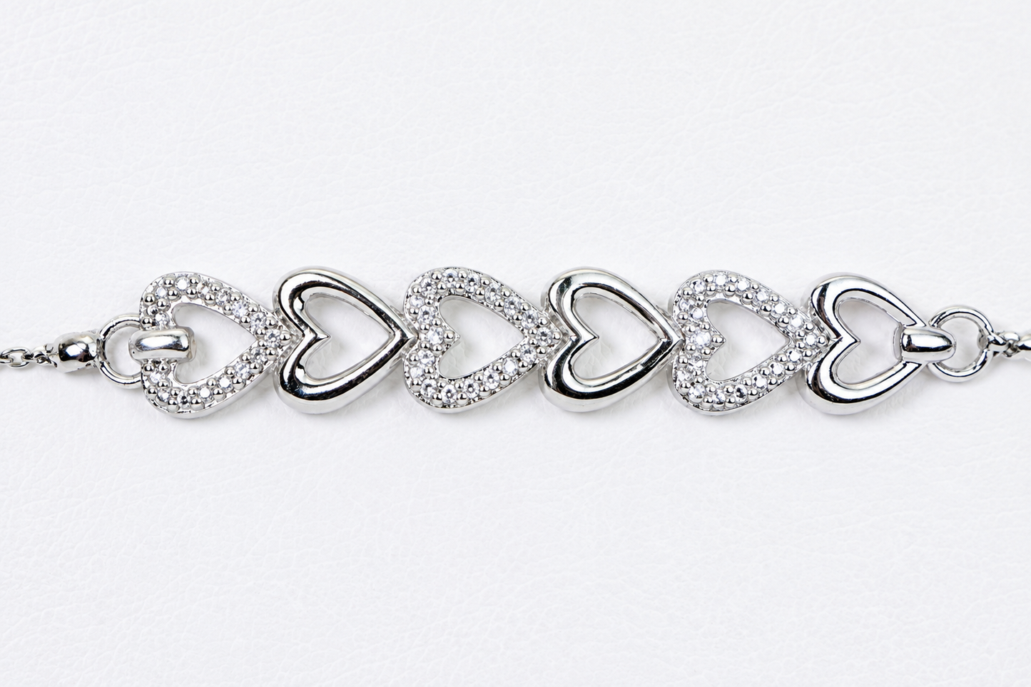 Diamond Six Heart Bracelet: 14k White Gold over Sterling Silver