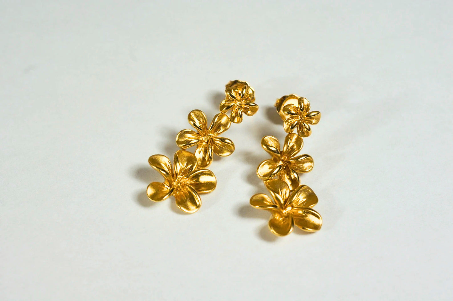 14K Yellow Gold Plumeria Flower Earrings, Graduated Floral Posts