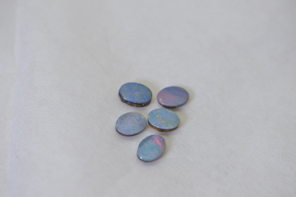 five opal cabochons 