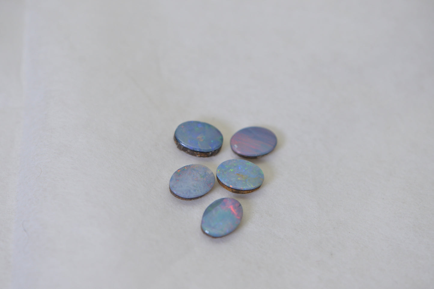 five opal cabochons 