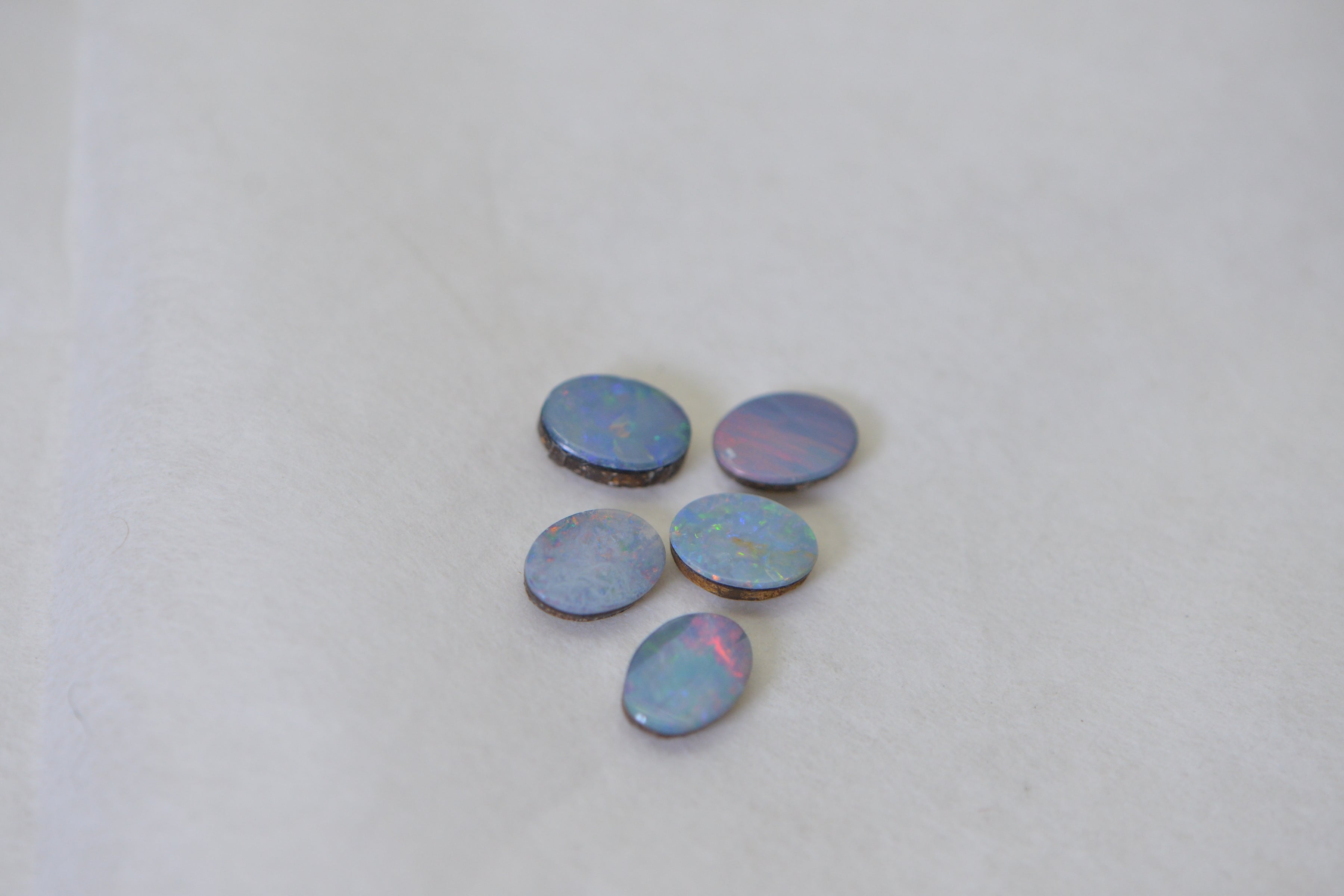 five opal cabochons 