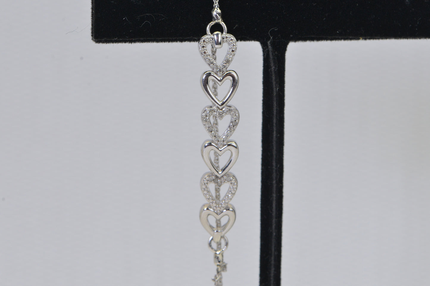 Diamond Six Heart Bracelet: 14k White Gold over Sterling Silver