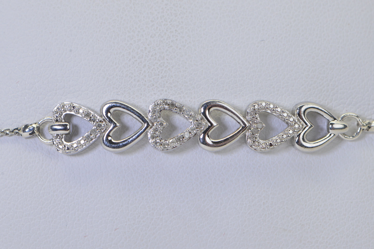 Diamond Six Heart Bracelet: 14k White Gold over Sterling Silver