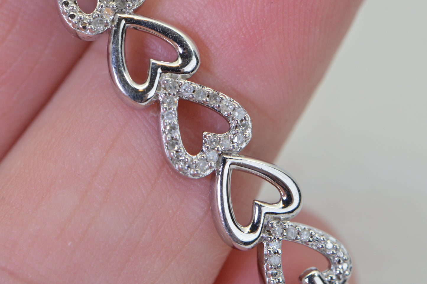 Diamond Six Heart Bracelet: 14k White Gold over Sterling Silver
