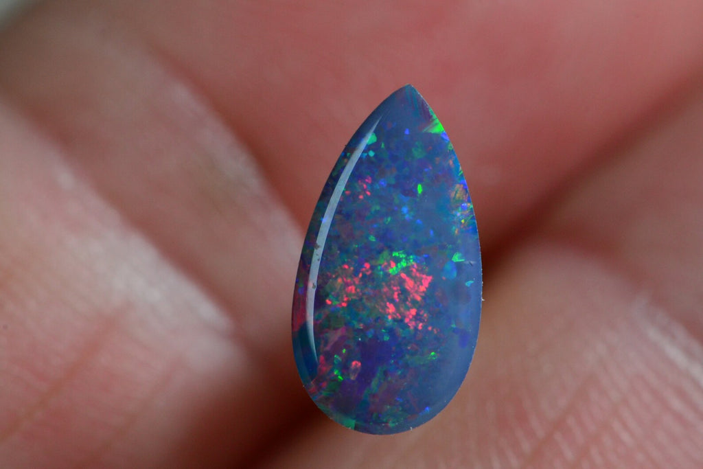 Australian Black Opal Doublet: 0.85CT Pear Cabochon, Blue Broad Flash (11X6mm)