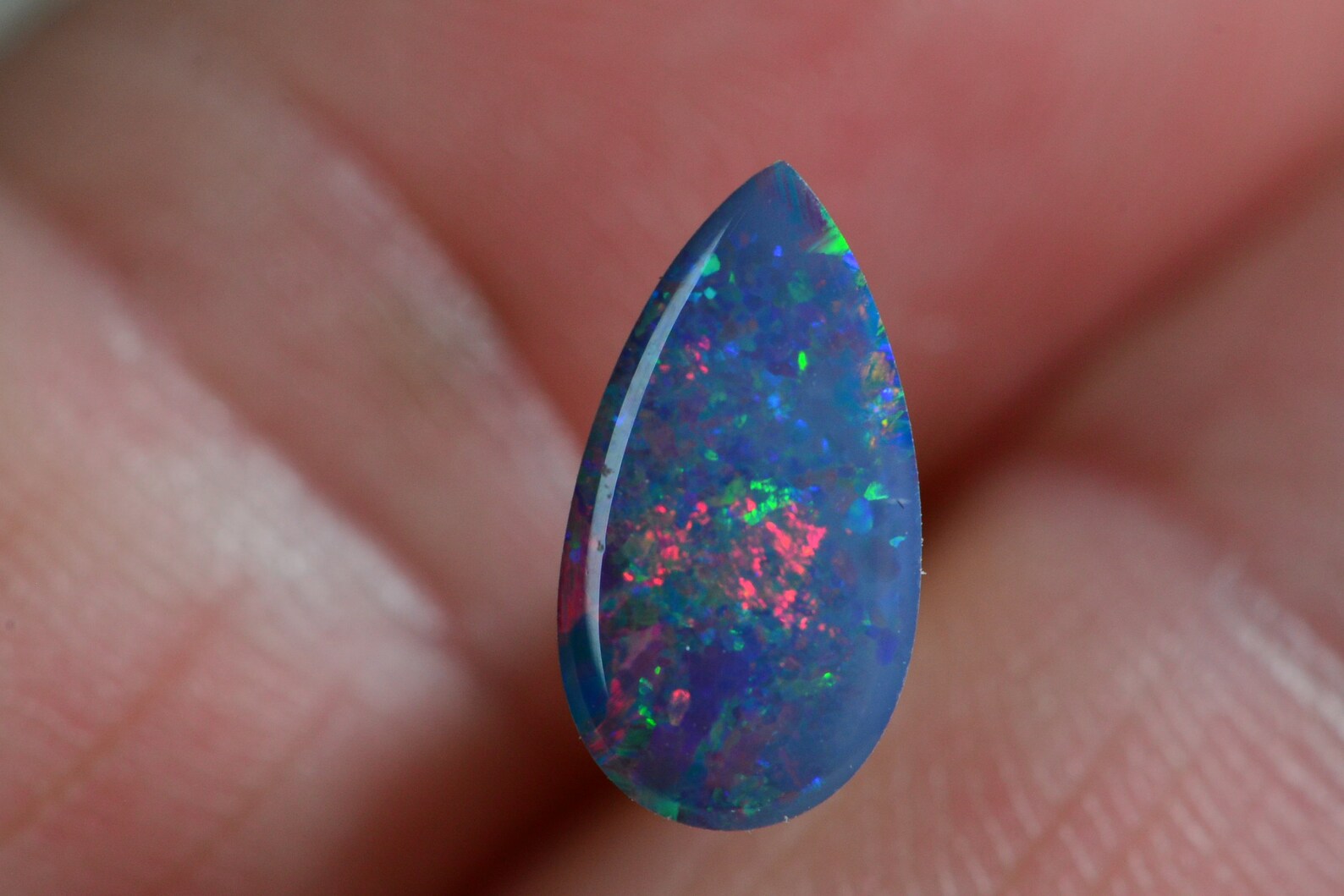 Australian Black Opal Doublet: 0.85CT Pear Cabochon, Blue Broad Flash (11X6mm)
