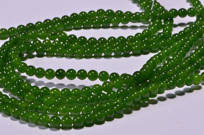 5.4mm AA Translucent Green Jade Beads: 15" Strand