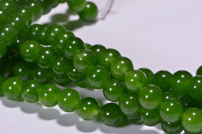 5.4mm AA Translucent Green Jade Beads: 15" Strand