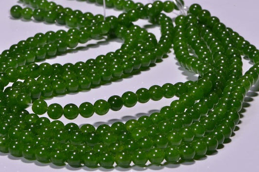5.4mm AA Translucent Green Jade Beads: 15" Strand
