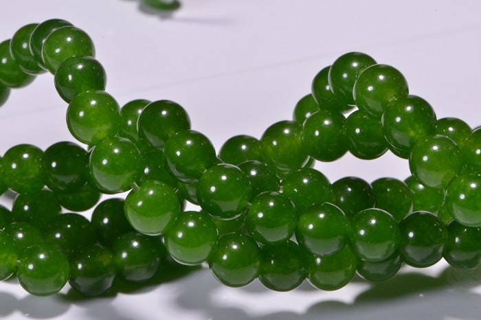 5.4mm AA Translucent Green Jade Beads: 15" Strand
