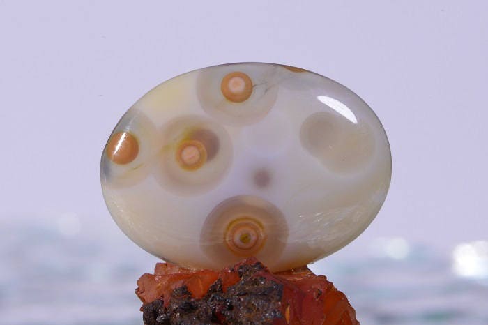 Ocean Jasper Cabochon: Oval Gemstone with Yellow-Orange Orbs (30x22x5.2mm)