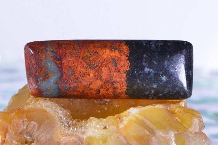 Sonora Sunrise Cabochon: Hand Cut Cuprite Gemstone (34x12x6.8mm)