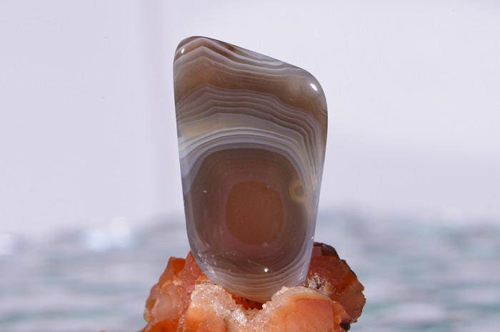 Banded Botswana Agate Cabochon: Amber, Red, Grey Gemstone (25x16x4.1mm)