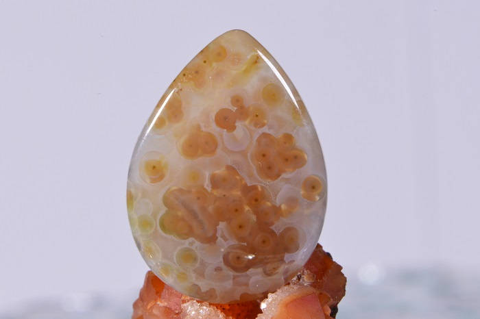 Teardrop Ocean Jasper Cabochon: Orange, White, and Brown Gemstone (30x22x5.3mm)