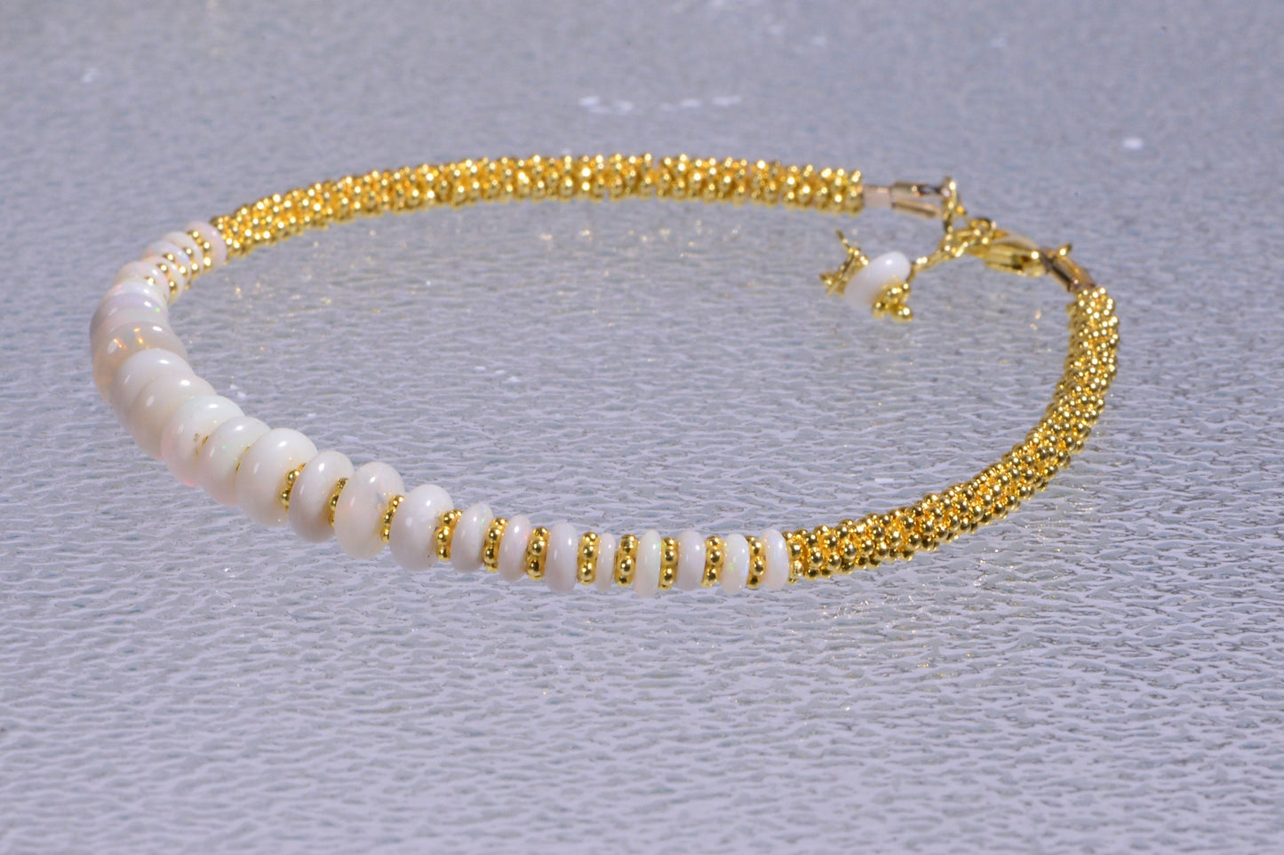 Australian white solid opal  bracelet 24K yellow gold over sterling silver.
