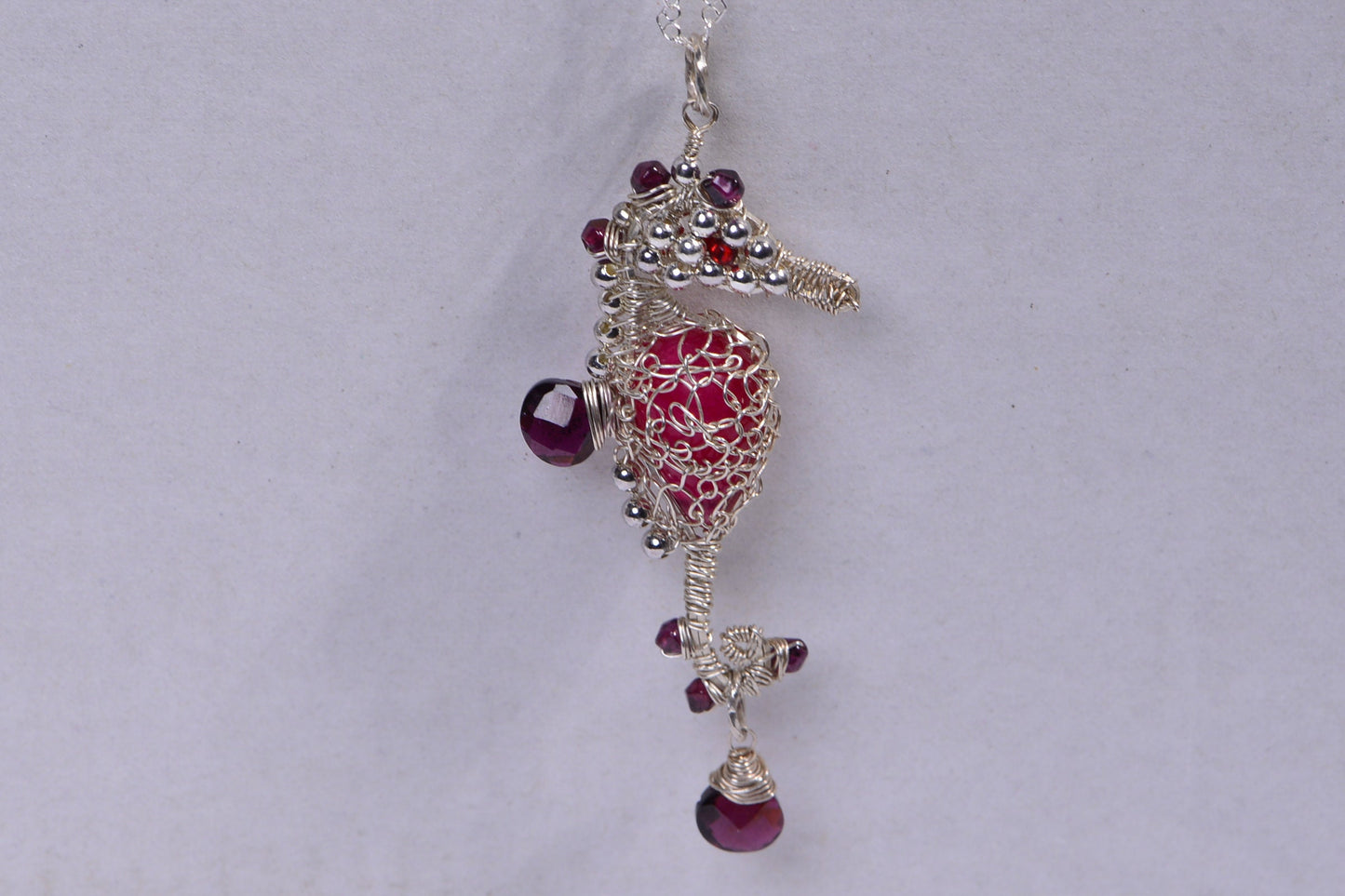 Seahorse Wire Wrapped Pendant , Sterling silver. Red Garnet. Red Onyx. Seahorse Jewelry