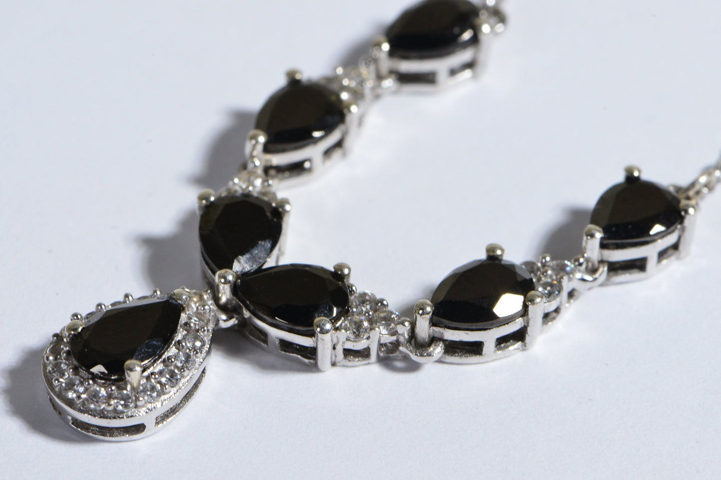 Black Spinel And White Zircon Halo Necklace Rhodium