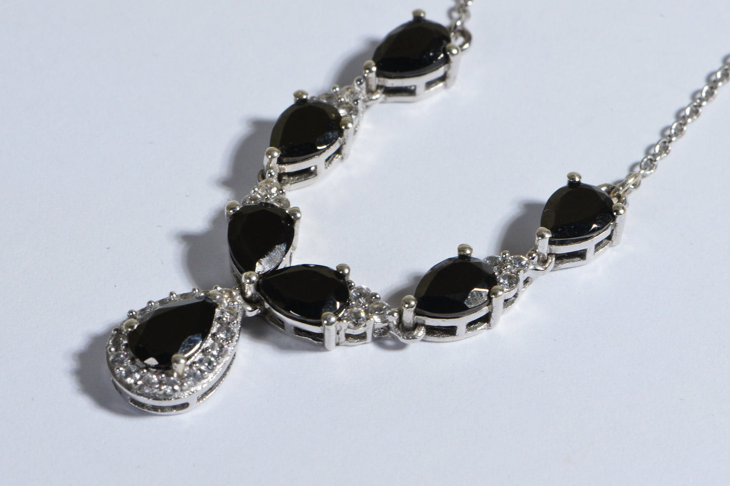 Black Spinel And White Zircon Halo Necklace Rhodium