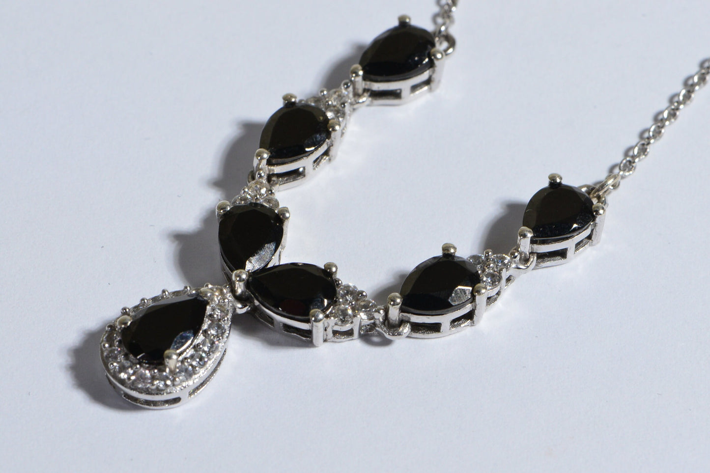 Black Spinel And White Zircon Halo Necklace Rhodium