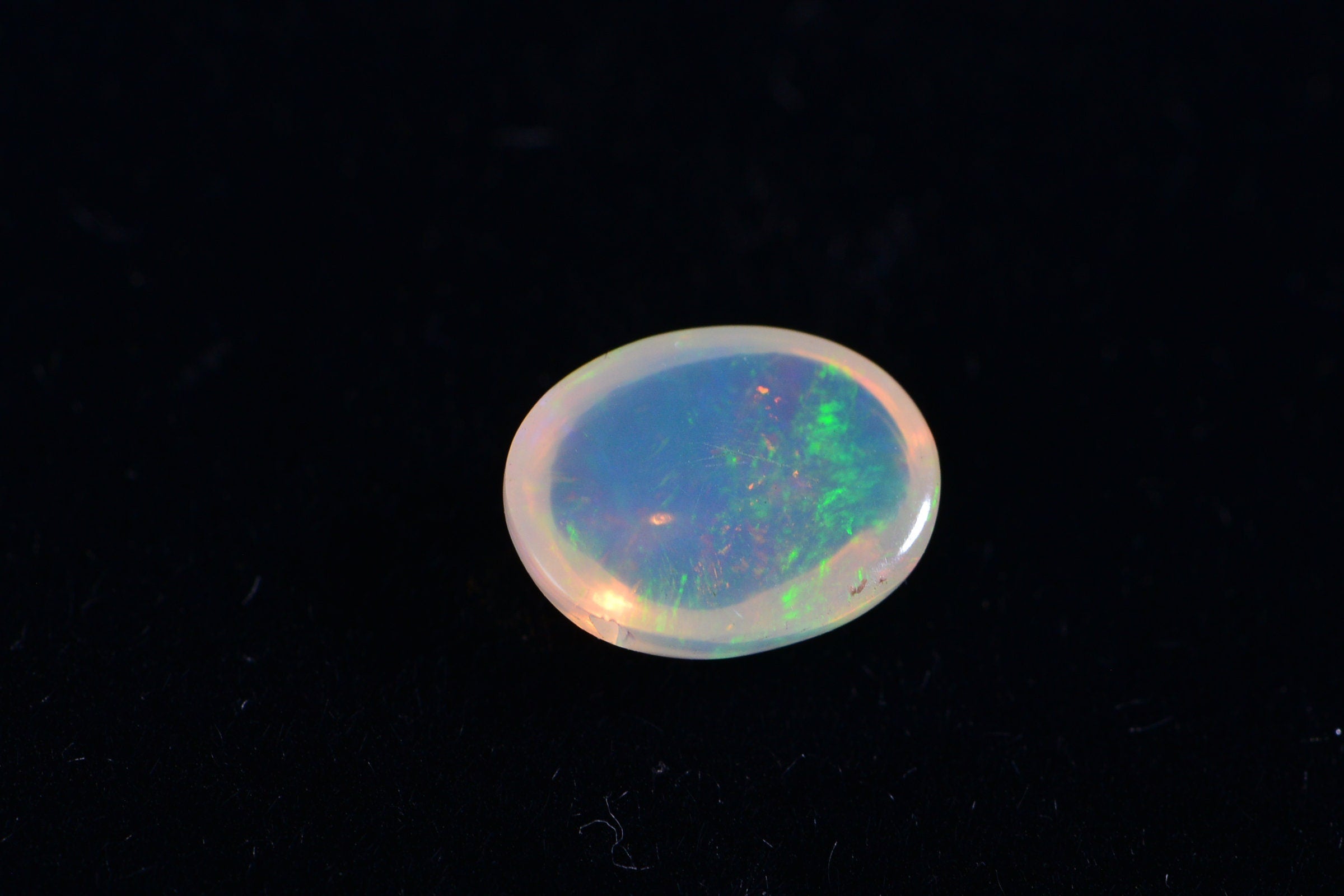 7X9mm Welo Opal Cabochon: Natural Ethiopian Gemstone