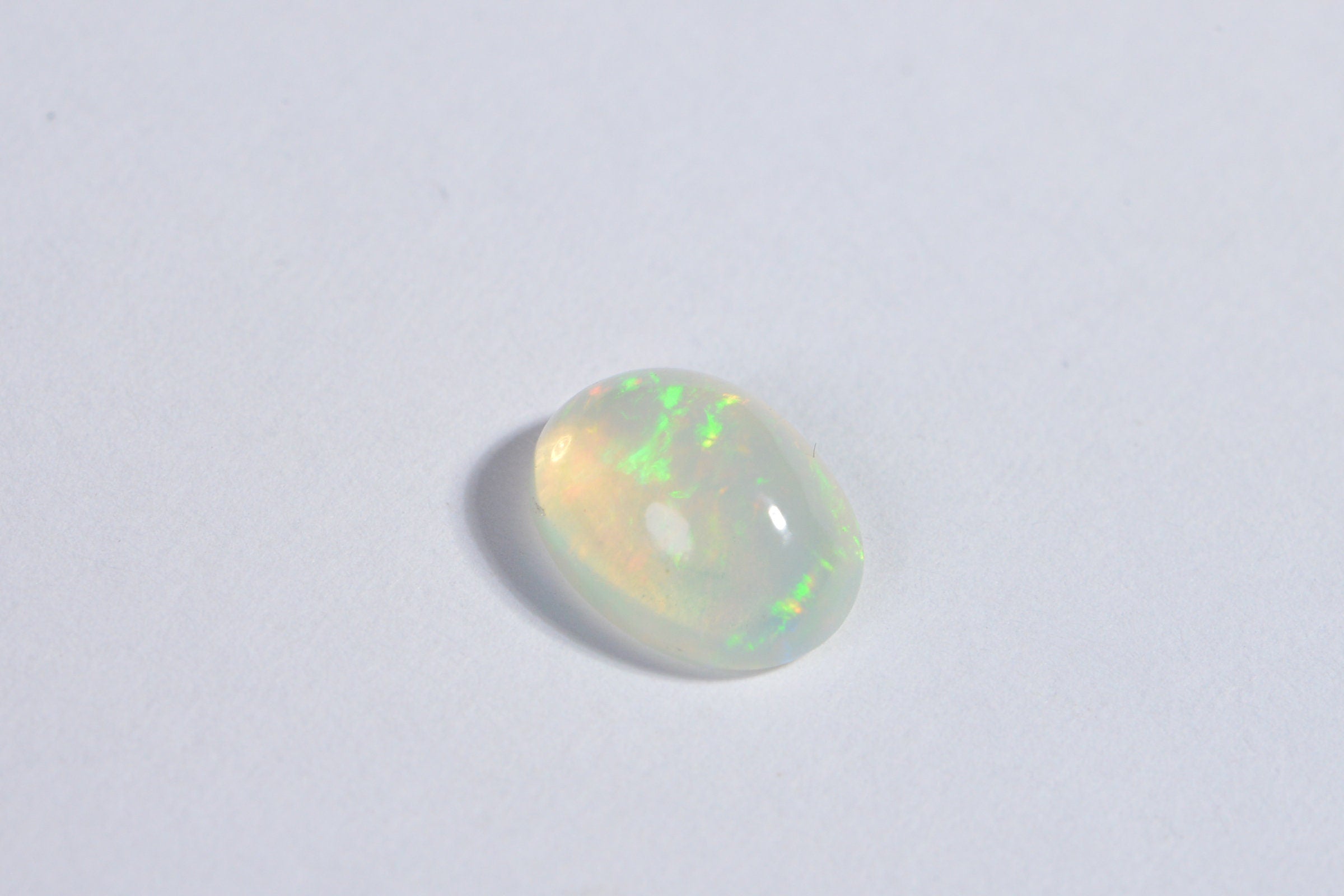 7X9mm Welo Opal Cabochon: Natural Ethiopian Gemstone