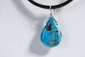 Sleeping Beauty Turquoise Pendant: Sterling Silver Wire Wrapped Teardrop