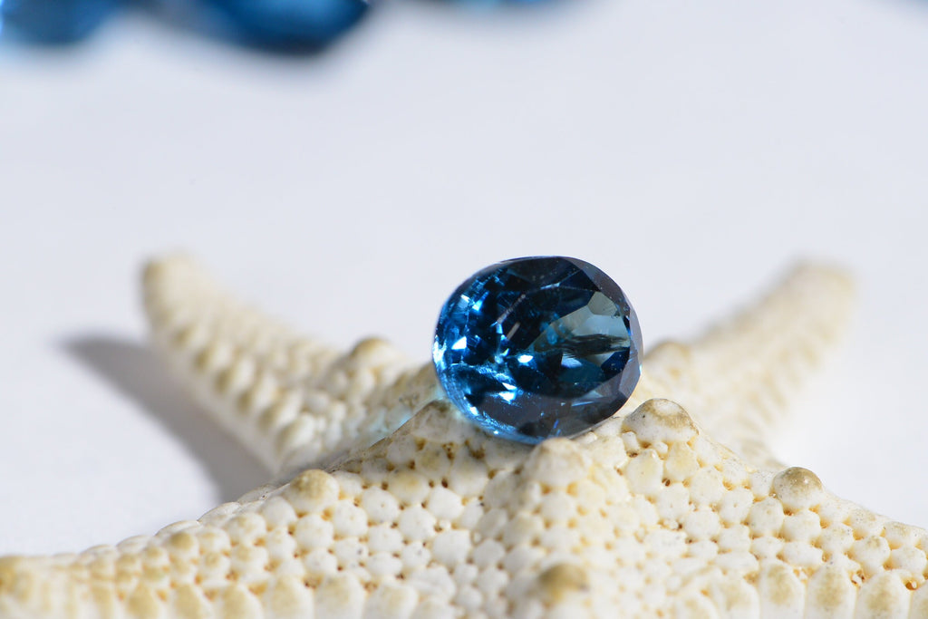 Oval London Blue Topaz Gemstone: Faceted Rose Cut, December Birthstone