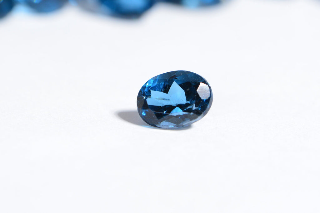 Oval London Blue Topaz Gemstone: Faceted Rose Cut, December Birthstone