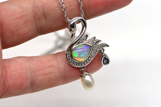 Welo Opal Swan Pendant: 14K White Gold Over Sterling Silver, Pearl & Topaz Accent