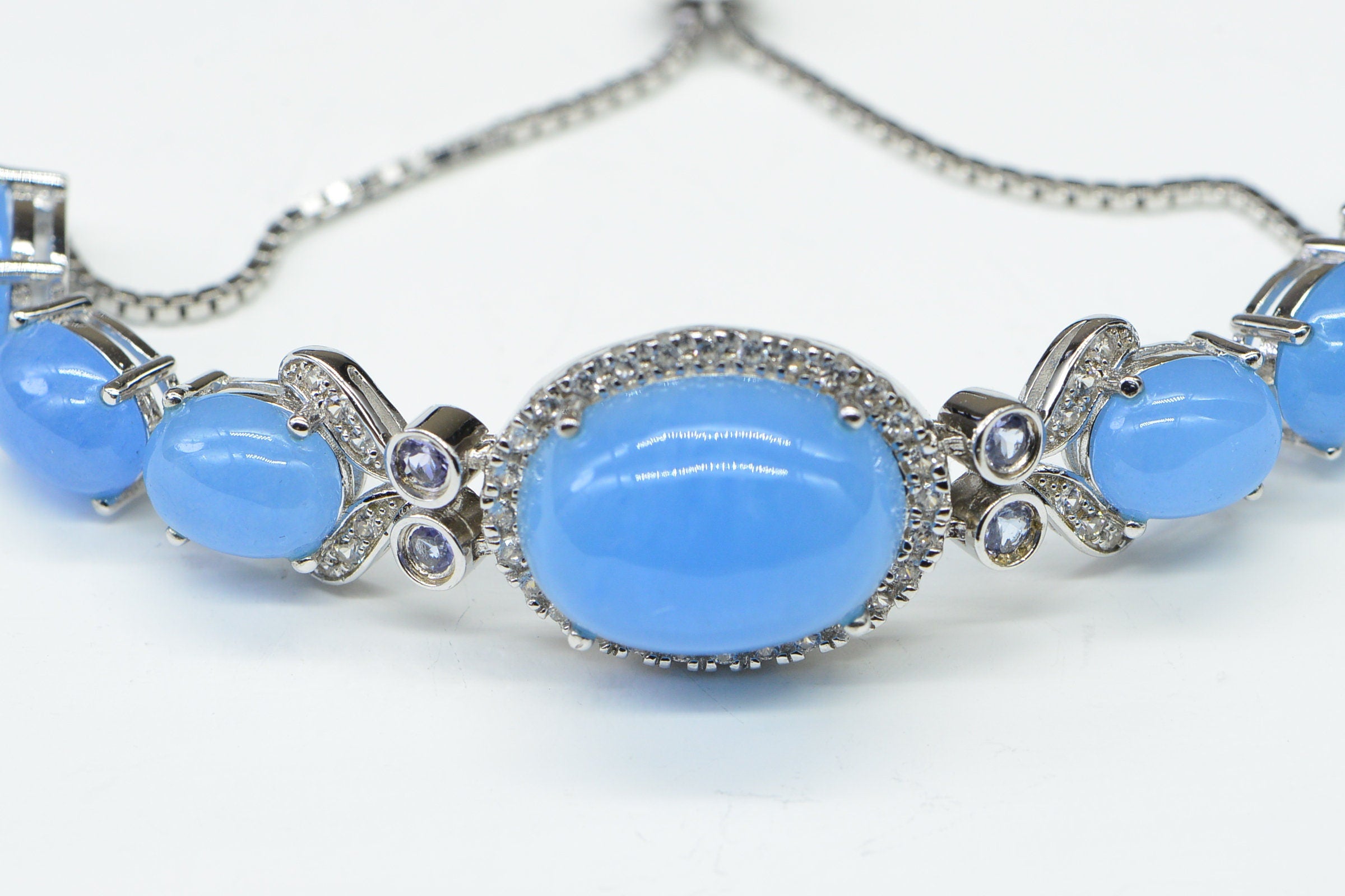 Blue Jade Bolo Bracelet: Sterling Silver, Zircon & Tanzanite