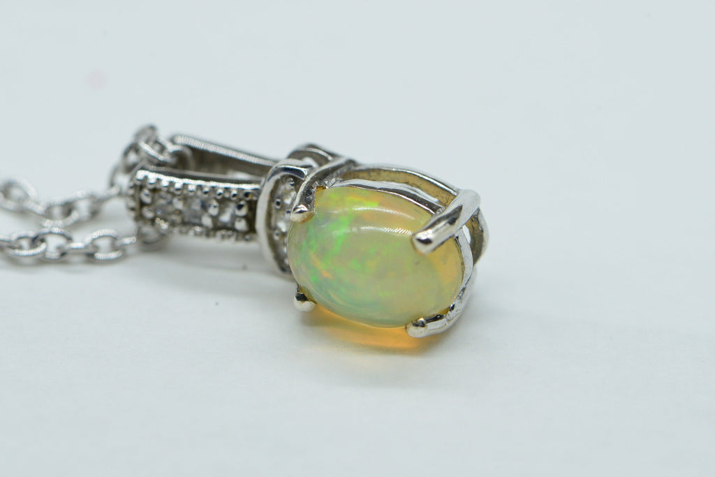 Ethiopian Welo Opal Pendant: Sterling Silver Birthstone Charm