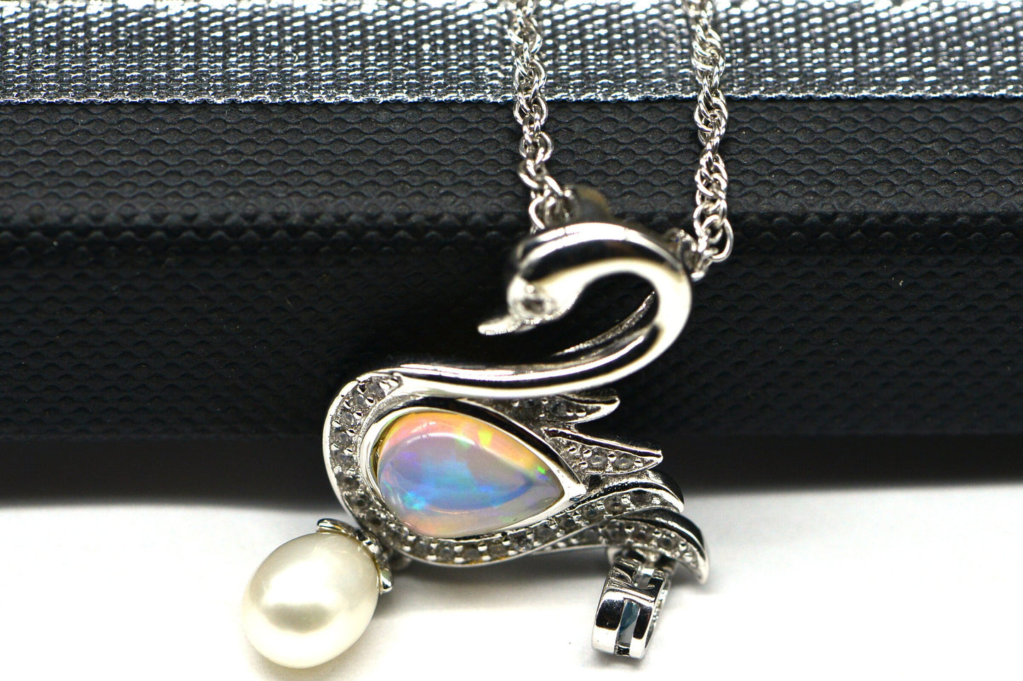 Welo Opal Swan Pendant: 14K White Gold Over Sterling Silver, Pearl & Topaz Accent