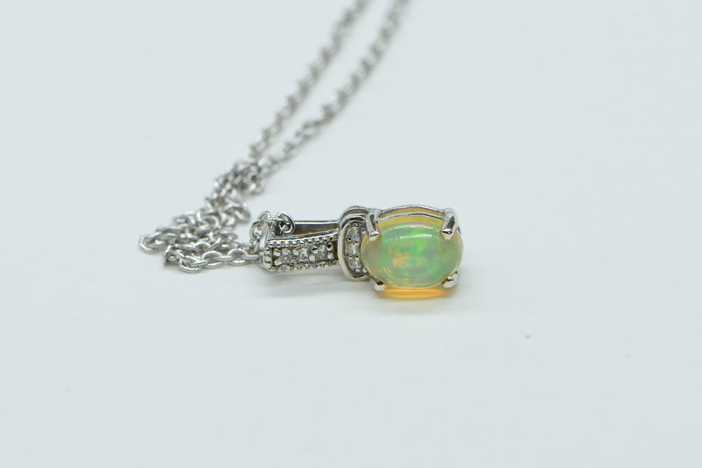 Ethiopian Welo Opal Pendant: Sterling Silver Birthstone Charm