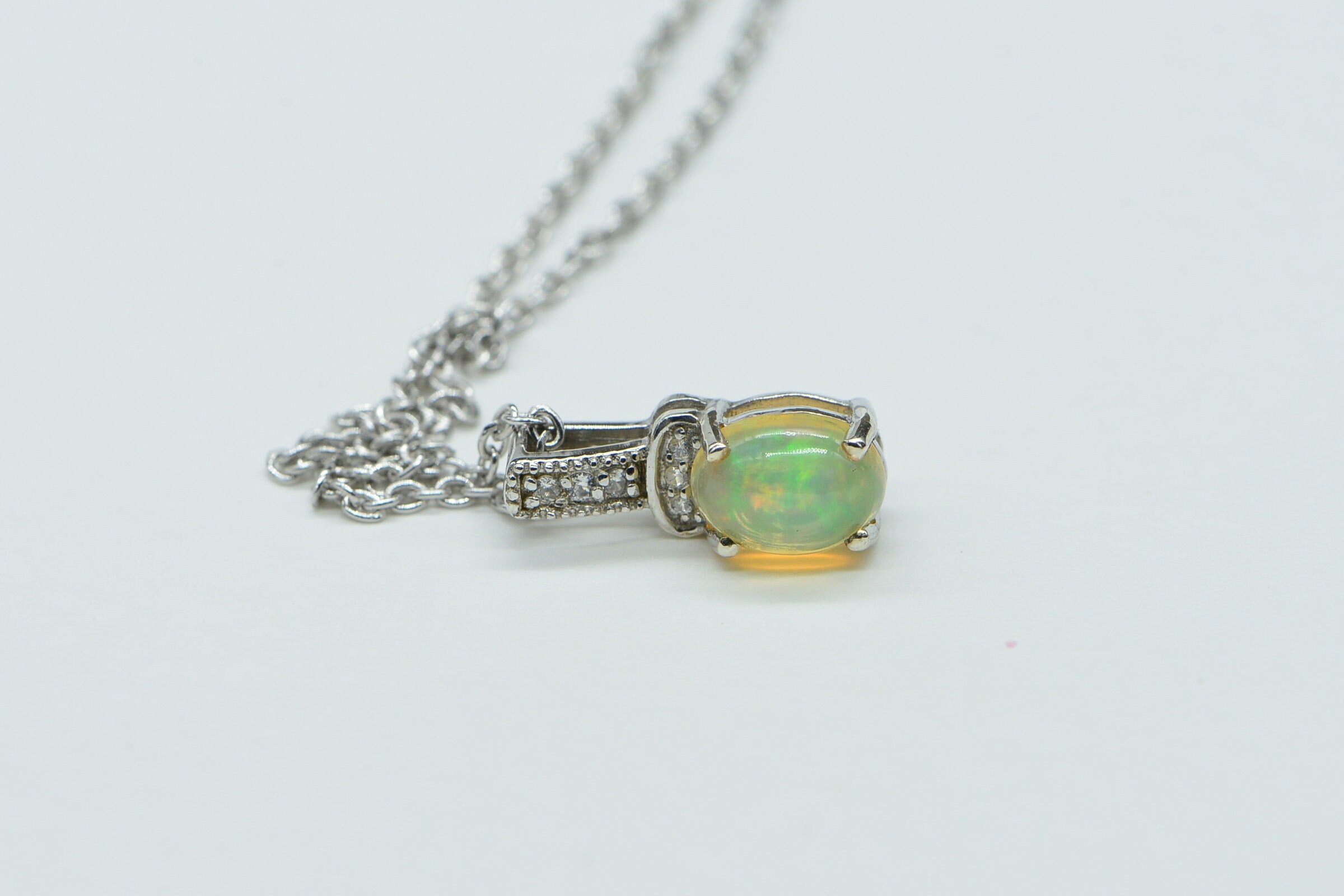 Ethiopian Welo Opal Pendant: Sterling Silver Birthstone Charm