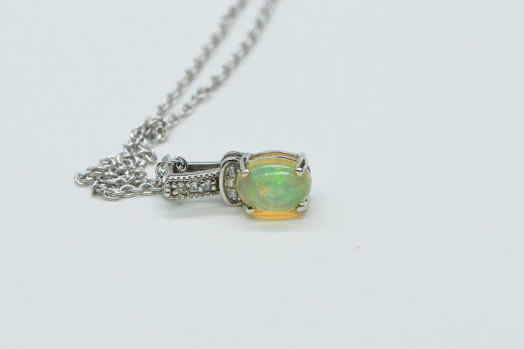 Ethiopian Welo Opal Pendant: Sterling Silver Birthstone Charm